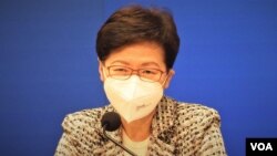 香港特首林郑月娥表示,4月21日大部份防疫措施可以分3个月、3阶段逐步解除,但是限聚令及口罩令仍然会持续一段日子 (美国之音/汤惠芸)
