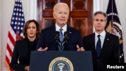 美国总统乔·拜登在华盛顿白宫就加沙停火协议发表讲话。图为拜登(中),左侧是副总统哈里斯,右侧是国务卿布林肯。