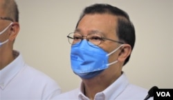 李家超竞选办主任、中国全国人大常委谭耀宗表示,会视不支持票和白票为压力及鞭策,努力做得更好 (美国之音/汤惠芸)