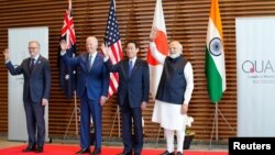 参与印太地区安全四方机制会谈的四国领导人2022年5月24日在东京聚首。(路透社转发媒体联访照片)