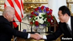 美国总统拜登2022年5月23日在东京与日本首相岸田文雄会面。(路透社)