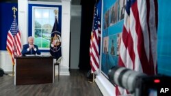 资料照片:拜登总统2021年9月22日在第76届联合国大会期间在白宫南院礼堂举行的COVID-19在线峰会上讲话。(美联社)