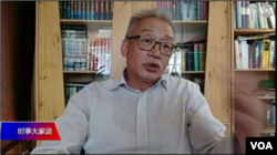 资料照片:王维洛博士连线参加美国之音电视节目