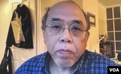 香港民意研究所前副行政总裁钟剑华表示,在中国内地疫情大爆发之下通关,难免引起港人疑虑 (美国之音/汤惠芸)