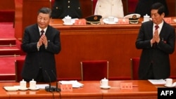 2022年10月22日,在北京人民大会堂举行的中共二十大闭幕式上,前中共总书记胡锦涛被离席后留下的空座位。