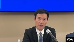 台湾财团法人国际合作发展基金会技术合作处处长颜铭宏2022年10月26日在华盛顿智库全球台湾研究中心说明台湾对外援助计划。(美国之音锺辰芳拍摄)