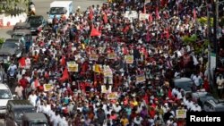 Members and supporters of Sri Lanka's opposition the National People's Power Party march during a protest against President Gotabaya Rajapaksa, amid the country's economic crisis, in Colombo, April 19, 2022.