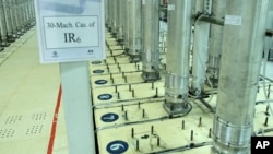 FILE - This file photo released Nov. 5, 2019, by the Atomic Energy Organization of Iran, shows centrifuge machines in the Natanz uranium enrichment facility in central Iran.