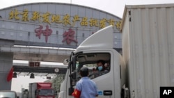 资料照:新冠疫情中的北京新发地农产品批发市场。(2020年9月6日)