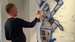 美国万花筒:机器人画家作画不费力 美国万花筒:机器人画家作画不费力