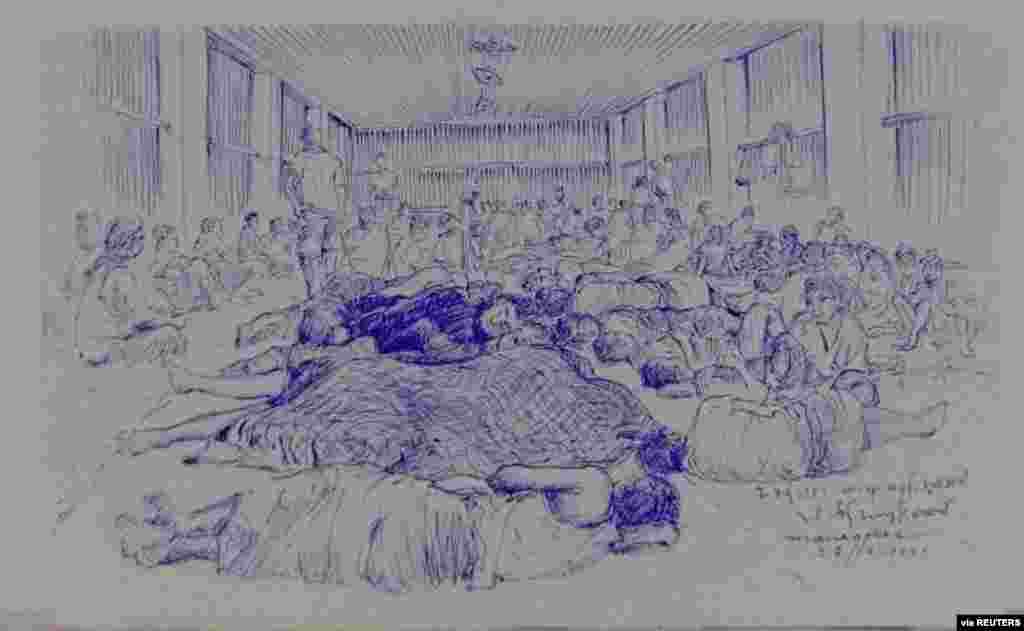 MYANMAR-POLITICS/PRISON -A smuggled sketch shows people inside of Myanmar's Insein prison with a written date April 17, 2021, in this undated picture obtained by REUTERS