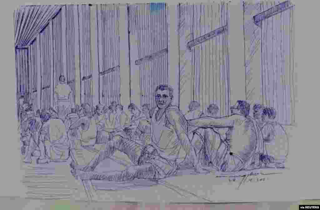 MYANMAR-POLITICS/PRISON -A smuggled sketch shows people inside of Myanmar's Insein prison with a written date April 17, 2021, in this undated picture obtained by REUTERS