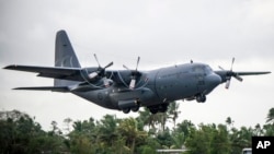 C-130 Hercules အမျိုးအစား စစ်ရေးဆိုင်ရာ သယ်ယူပို့ဆောင်ရေးလေယာဉ်။ (ယခင်ပုံဟောင်း)