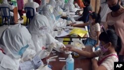 ဇွန်လ ၂၁ ရက်နေ့တုန်းက အင်ဒိုနီးရှားနိုင်ငံမှာ သွေးဖောက်ပြီး Covid စစ်စဉ် (ဓါတ်ပုံ-Antara)