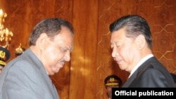 2015年4月21日巴基斯坦总统侯赛因会见到访的中国国家主席习近。
