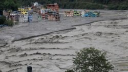 နီပေါ(လ်)နိုင်ငံမှာ ခရီးသည်တင် ဘတ်(စ)ကား ၂ စီး တောင်ကျရေနဲ့ မြစ်ထဲမျော  နီပေါ(လ်)နိုင်ငံမှာ ခရီးသည်တင် ဘတ်(စ)ကား ၂ စီး တောင်ကျရေနဲ့ မြစ်ထဲမျော