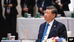 资料照:中国领导人习近平在泰国曼谷出席亚太经合组织峰会。(2022年11月19日)