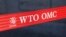 资料照：位于日内瓦的世界贸易组织大楼外的世贸组织标识
