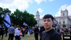 流亡英国的前香港区议员李轩朗。(美国之音郑乐捷)