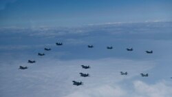 တိုက်လေယာဉ် ၂၀ နဲ့ ကန်-တောင်ကိုရီးယား လေကြောင်းအင်အားပြ တိုက်လေယာဉ် ၂၀ နဲ့ ကန်-တောင်ကိုရီးယား လေကြောင်းအင်အားပြ