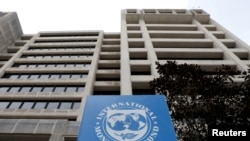 资料照片: 2019年4月8日,美国华盛顿,国际货币基金组织总部大楼。