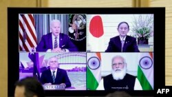 资料照片:四方安全对话机制成员国通过视频举行高峰会议(2021年3月12日)