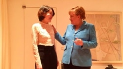 默克尔会见709律师家属 关注刘霞及人权议题 默克尔会见709律师家属 关注刘霞及人权议题