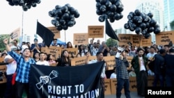 Myanmar press freedom advocates and youth activists hold a demonstration demanding