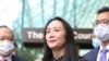 华为高管孟晚舟获释后在不列颠哥伦比亚省最高法院外对媒体宣读声明。(2021年9月24日)