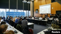 世界卫生组织就新冠病毒疫情在日内瓦召开新闻发布会。(2020年2月11日)