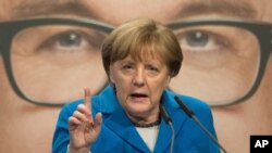 德国总理默克尔2016年3月8日在一次竞选集会上发表演说