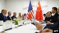 美国总统特朗普在大阪G20峰会期间与中国国家主席习近平举行双边会谈(2019年6月29日)。