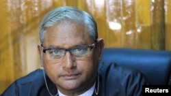 Confetti flies at the start of the Macy's Thanksgiving Day Parade in New York.