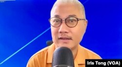 时事评论员黄伟国表示,失去国际化特色的香港,如何吸引中国大陆新移民也是疑问。 (美国之音汤惠芸)