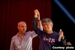 香港劳权监察总干事蒙兆达在2022年六月中出席出席法国工人民主联盟的大会并发言演说 (蒙兆达脸书照片)