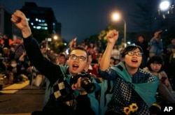 资料照:台湾学生举行集会纪念反服贸协议的学运太阳花运动两周年。(2015年3月18日)