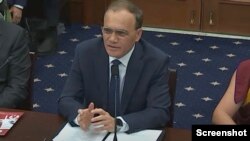 维吾尔国际学院院长热沙特·阿巴斯2024年12月5日出席CECC听证会。