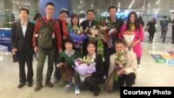 Maria Gonzalez of Mexico is assisted when she collapsed after crossing the finish line in the women's 20km Walk at the 2015 Pan American Games in Toronto, Canada. Gonzalez won with a mark of 1:29:24.