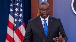 美国国防部长奥斯汀启程前往东南亚前与媒体见面(路透社2021年7月21日)