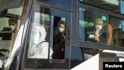 世界卫生组织国际专家组2021年1月14日抵达中国武汉(路透社)