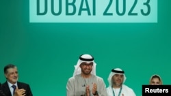 第28届联合国气候大会(COP 28)在谈判两周后2023年12月13日达成共识。(路透社)