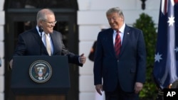 资料照:澳大利亚总理莫里森与美国总统特朗普在白宫南草坪 (2019年9月20日)