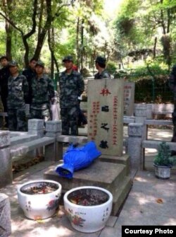 当局在林昭墓地派员把守(网络图片)