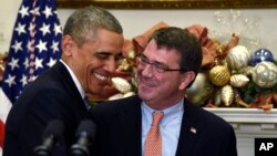 Президент Обама з Ештоном Картером