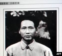 记者发现,毛泽东在1931年拍摄的这张照片里就已经有痣了,说明毛并不是在遵义会议以后才得痣的
