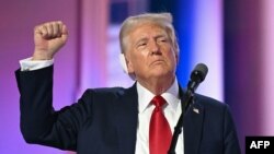 美国前总统、2024年共和党总统候选人唐纳德·特朗普在威斯康星州密尔沃基市举行的2024年共和党全国代表大会的最后一天发表演讲。(2024年7月18日)