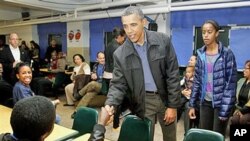 奥巴马总统1月16日在华盛顿参加一个社区服务活动,纪念民权领袖马丁·路德·金