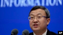 中国商务部副部长王受文在记者会上介绍《关于中美经贸磋商的中方立场》白皮书。(2019年6月2日)