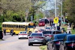 Police respond to a shooting at Austin-East Magnet High School in Knoxville, Tennessee, April 12, 2021. (Brianna Paciorka/News Sentinel/USA Today Network via Reuters)