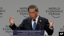 中国国务院总理李强出席世界经济论坛第十四届新领军者年会。(美联社)